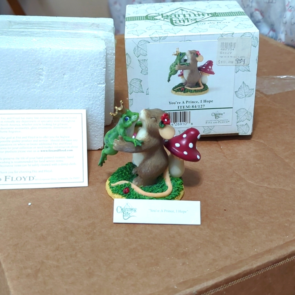 Charming tail by Fitz and Floyd collectible figurines.